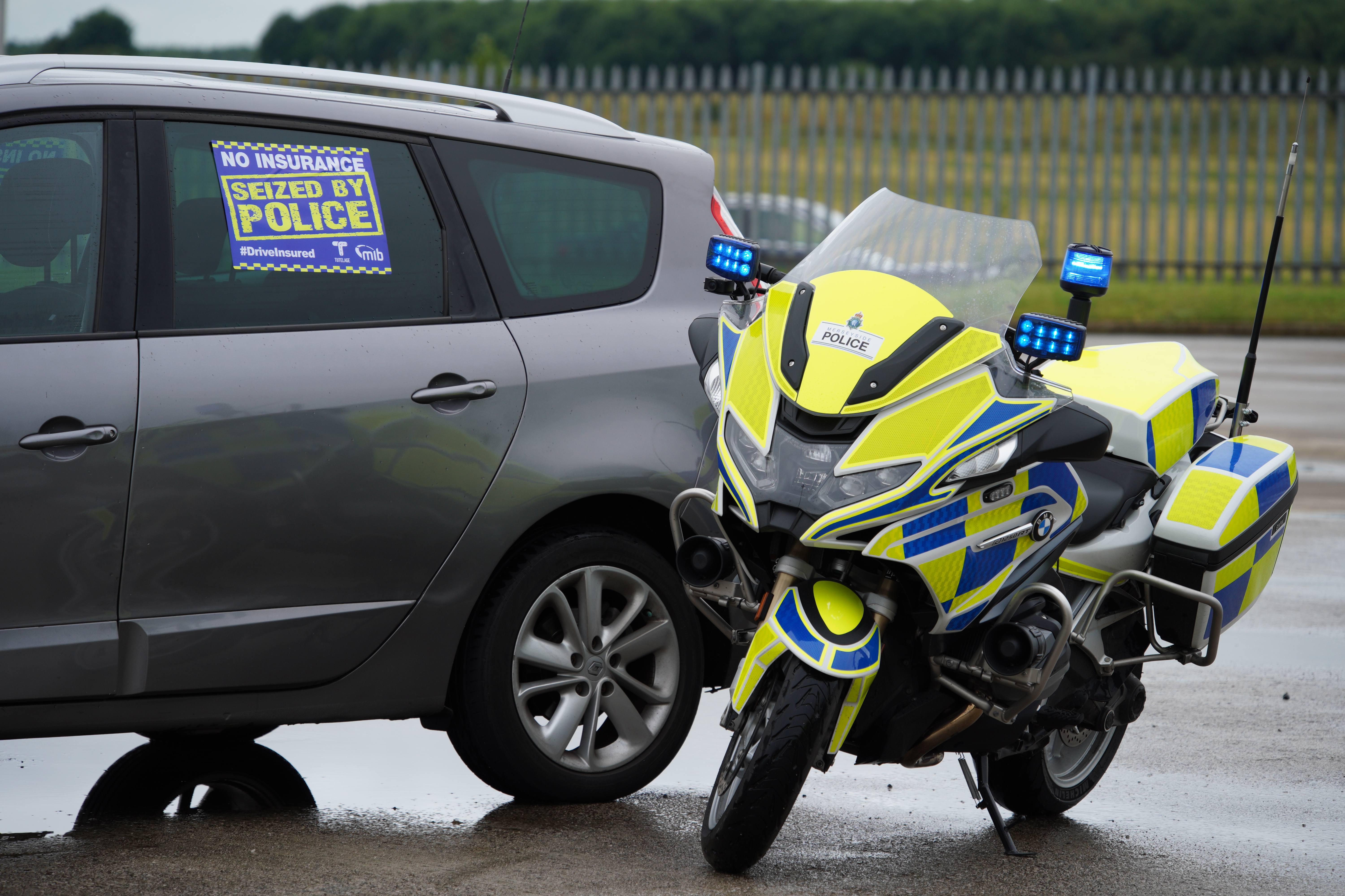 MIB seized vehicle with police motorbike